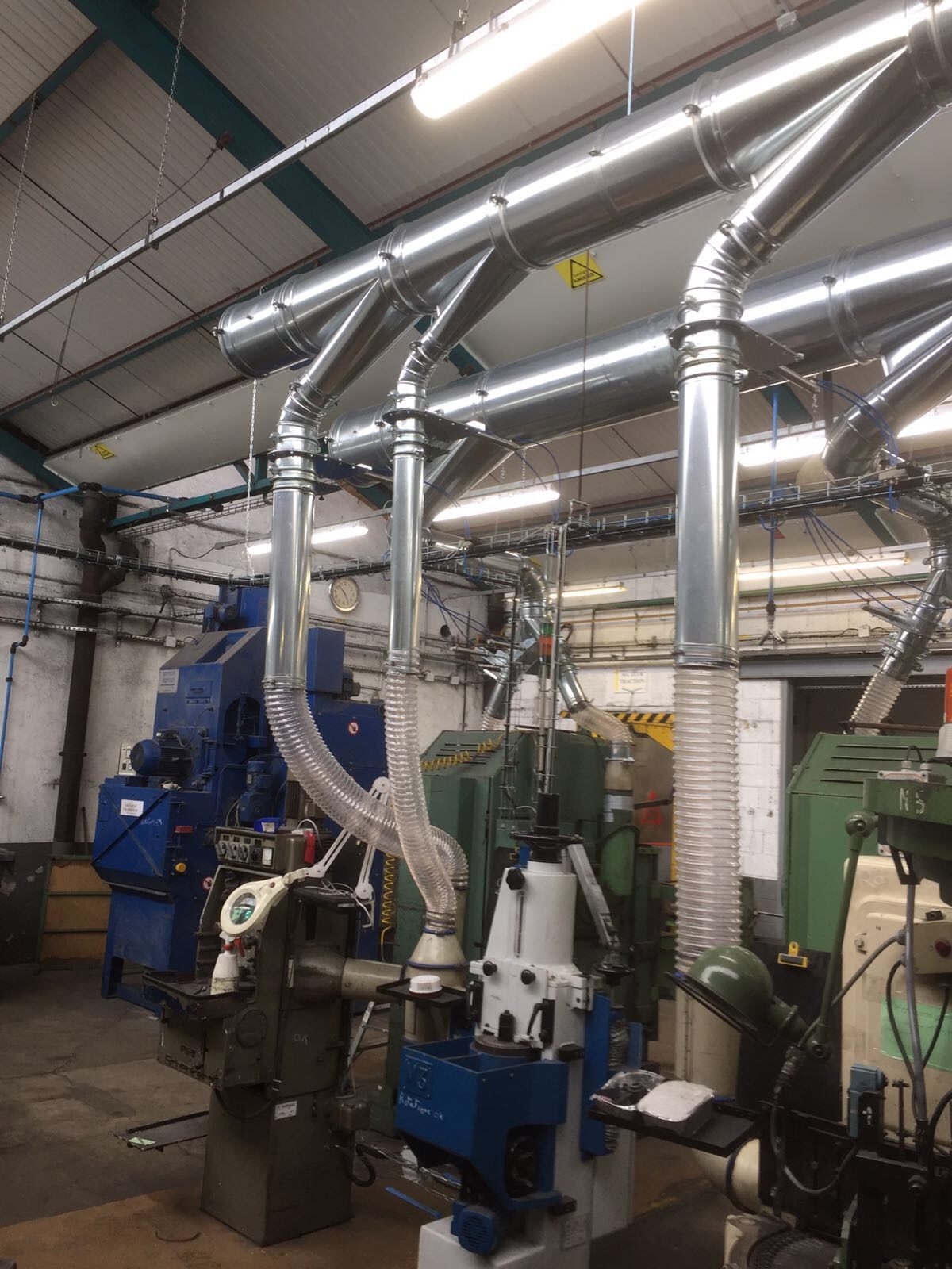 Dust extraction system of grinding for a spring manufacturer, project photo 6