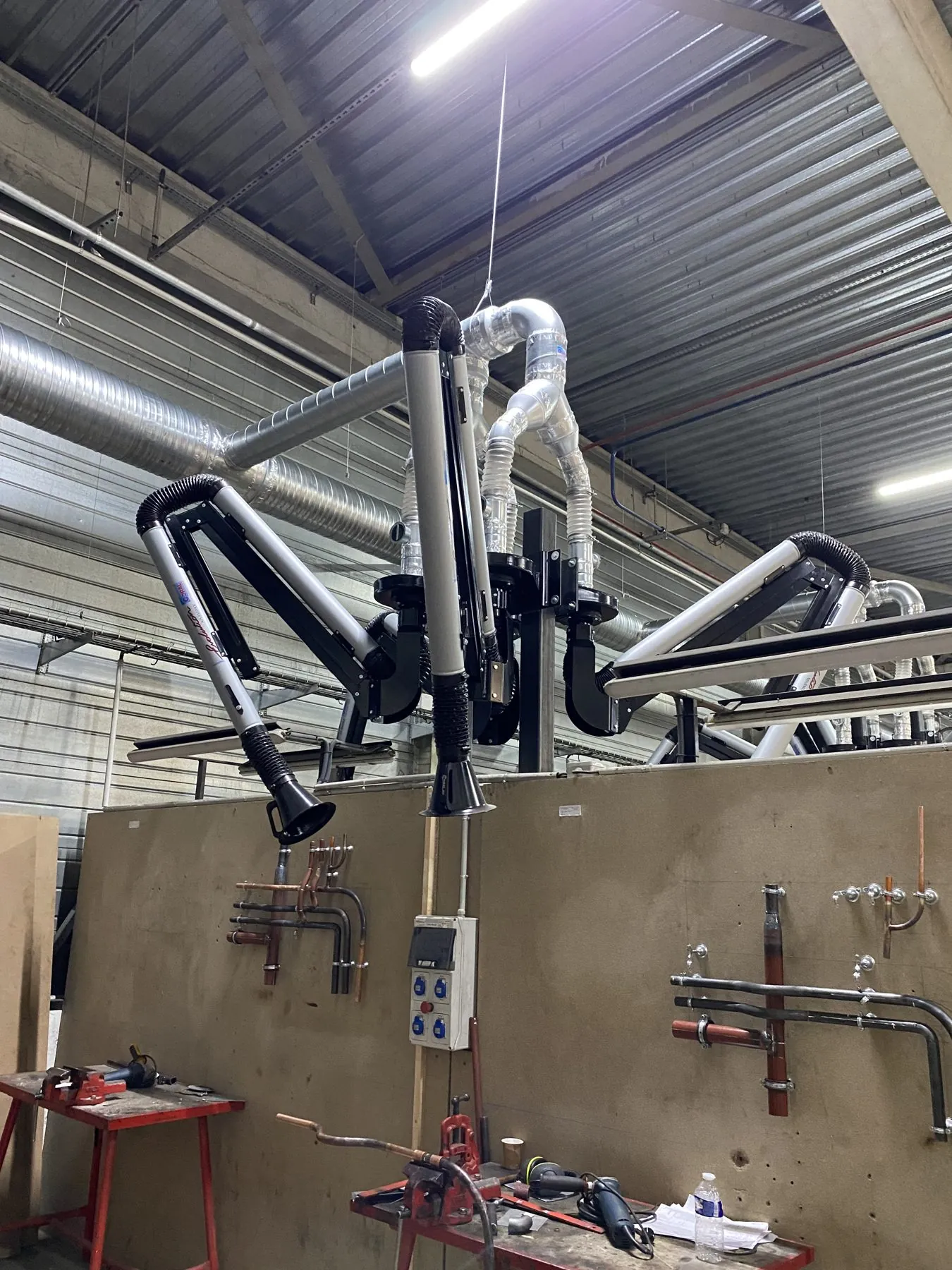 Extraction arms for a plumbing school, project photo 11